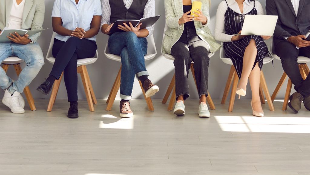Group of people with their legs crossed