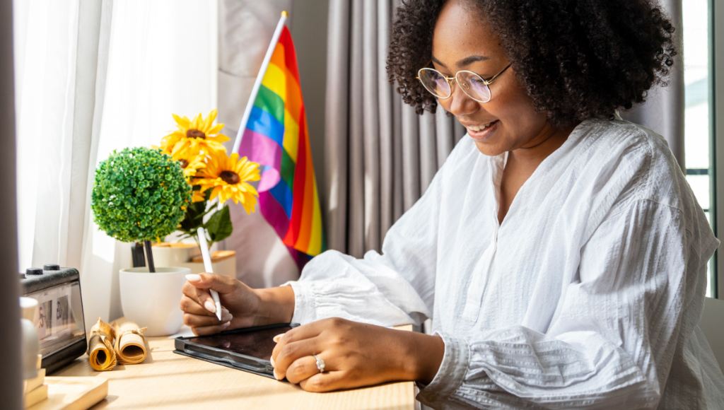 Woman holding a stylus for her tablet