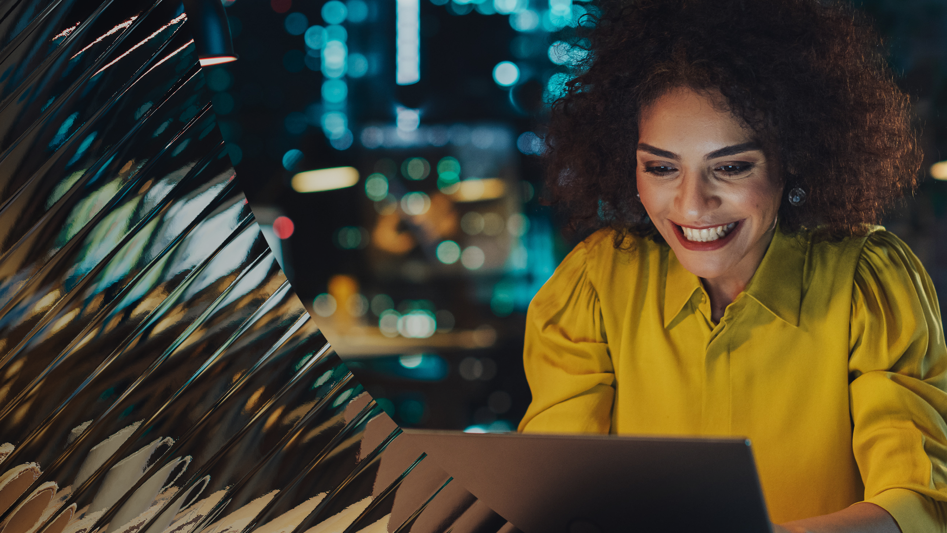 Happy lady user her laptop at night