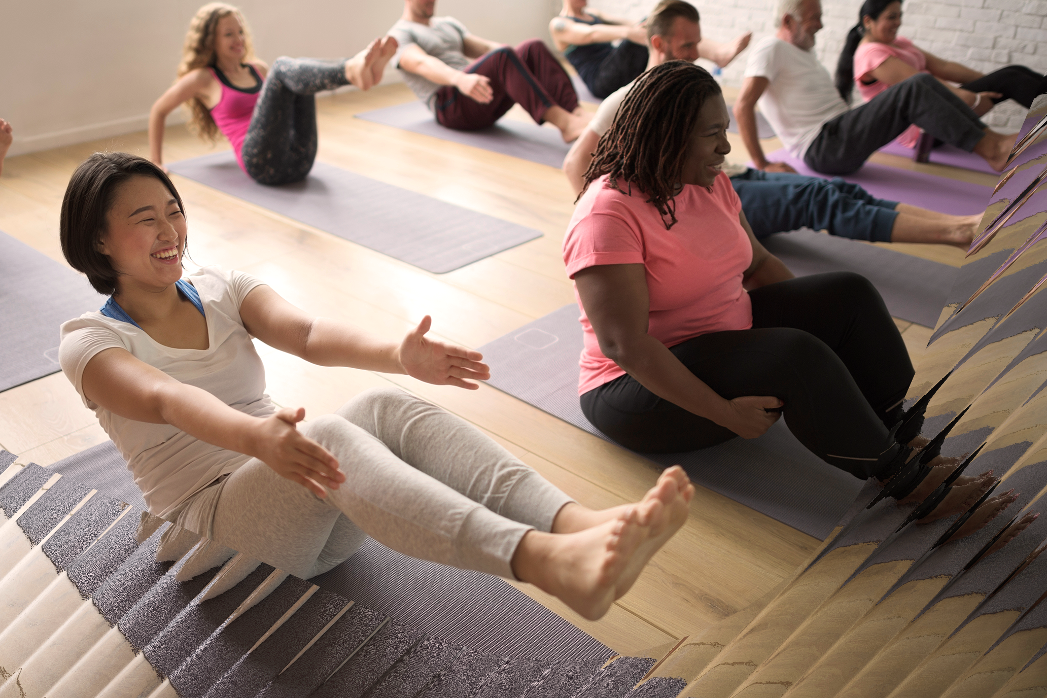 Diverse group doing a yoga pose together.