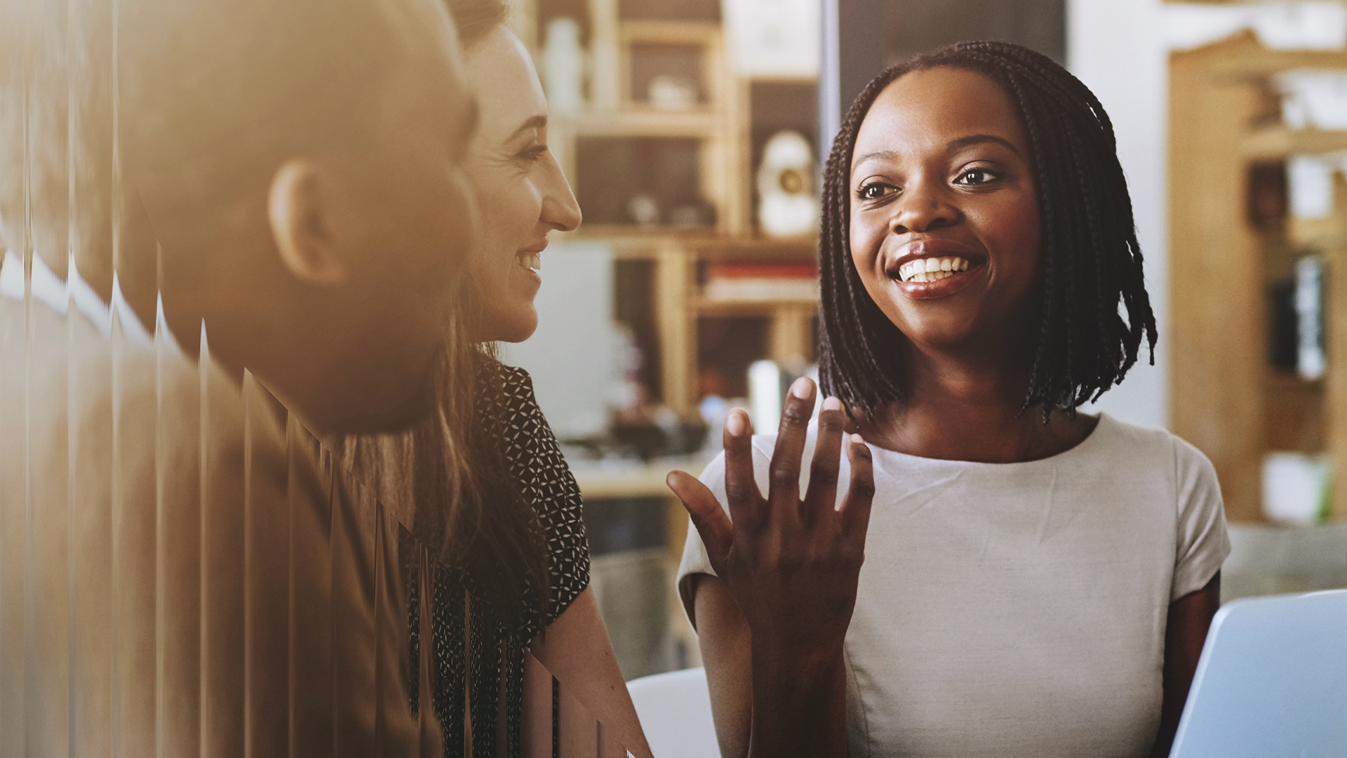 Woman talking to her co-workers