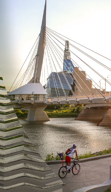 Provencher Bridge in Winnipeg with a man biking.