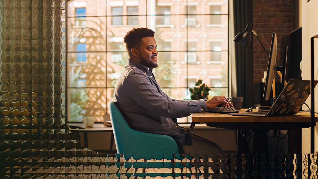 Man working from home using his desktop