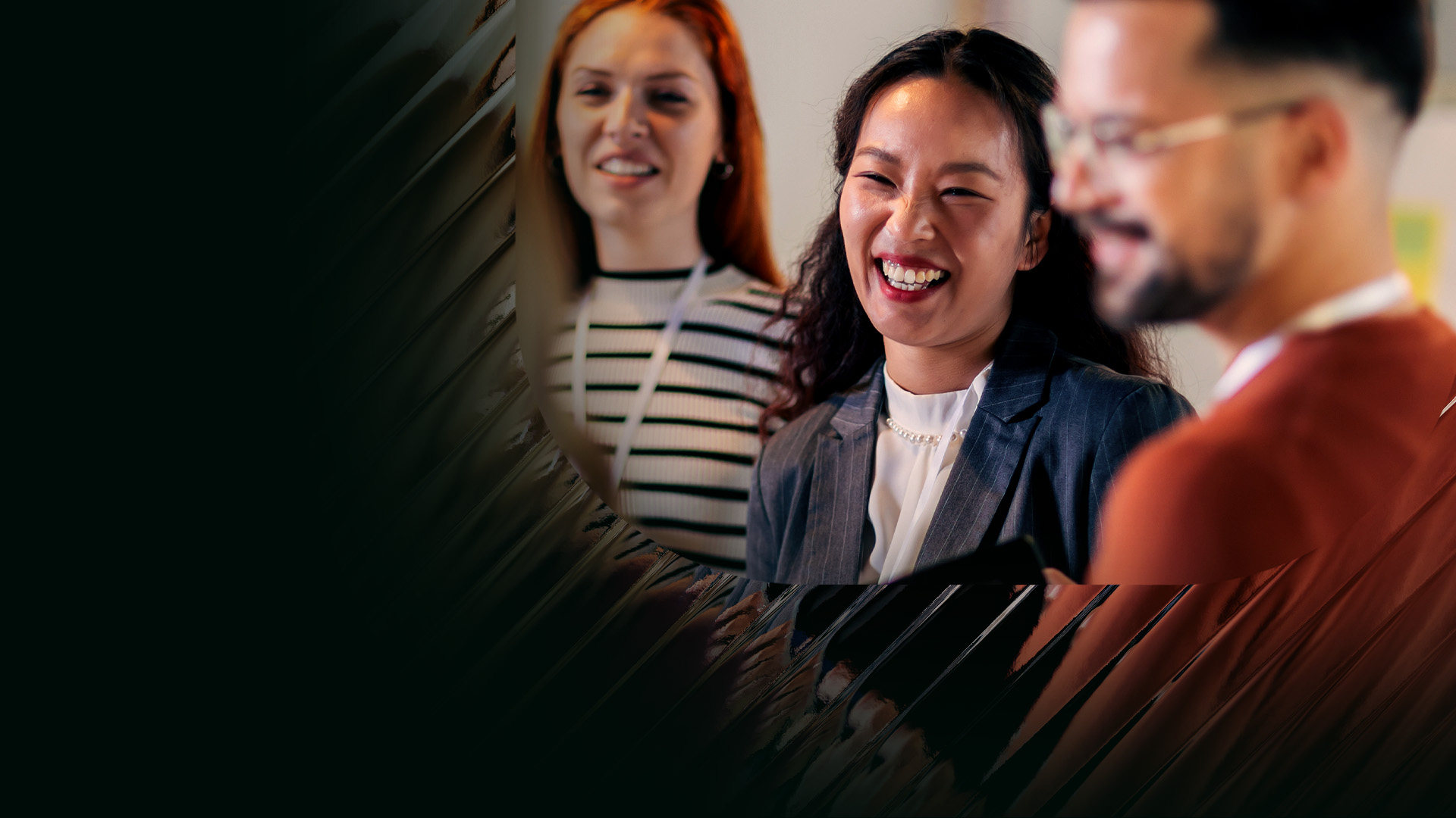 Happy smiling woman with her colleagues