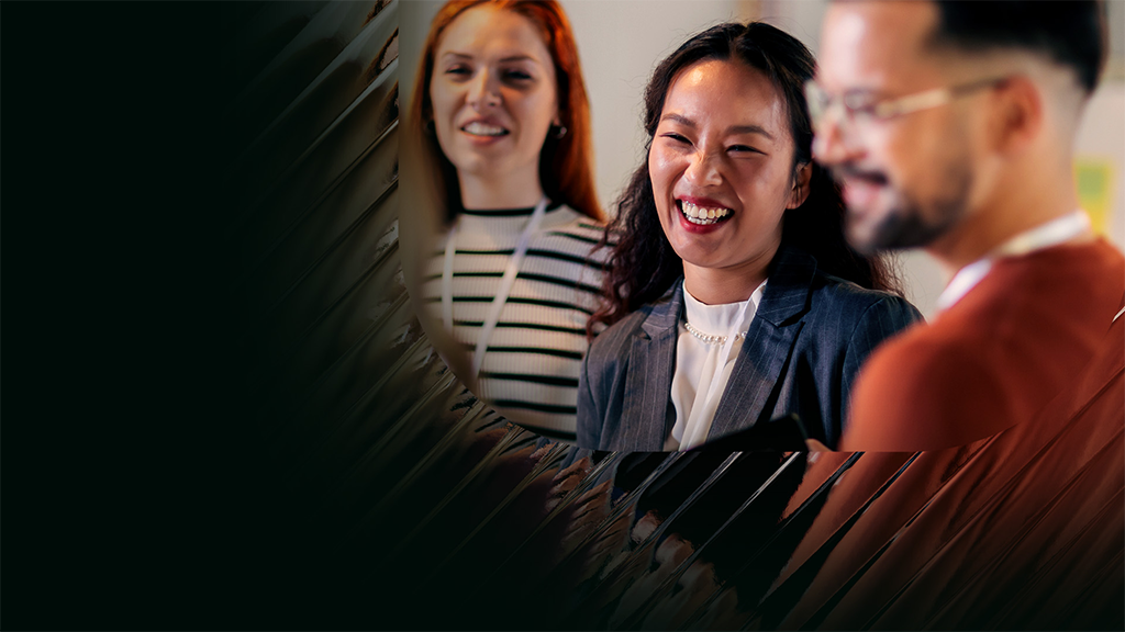 Happy smiling woman with her colleagues