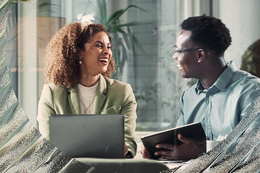 Image of two colleagues talking to each other