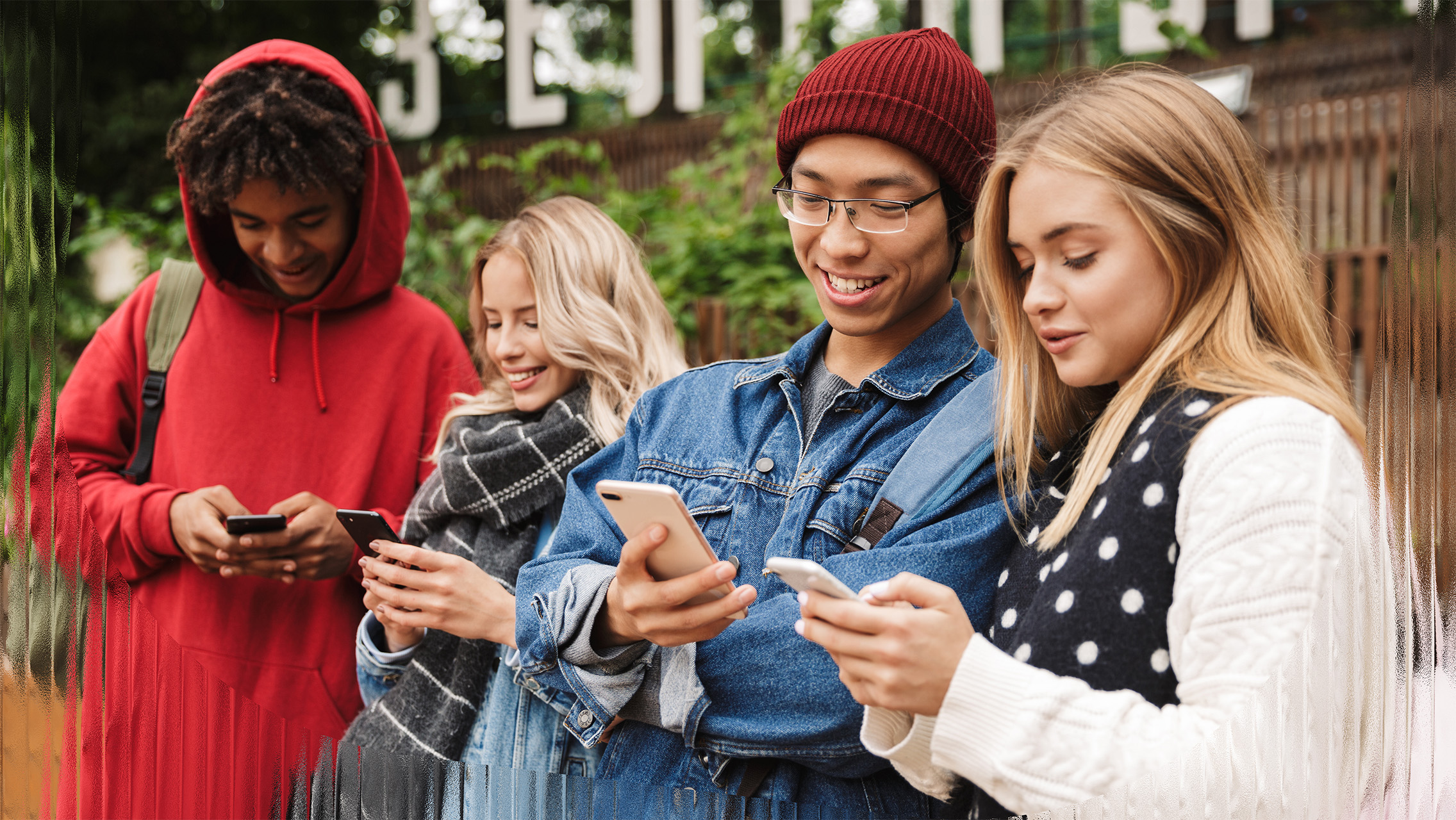Youths using smartphones